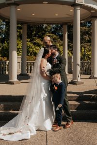 Outdoor garden wedding ceremony at Beaver Station in Beaver County Pennsylvania