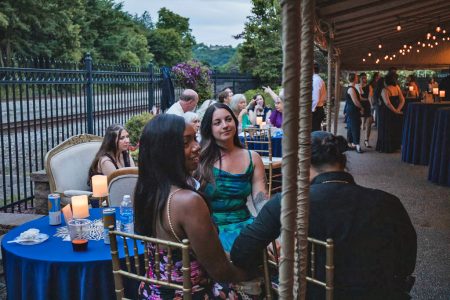 Wedding guests enjoy the outdoor courtyard at Beaver Station