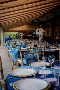 Gold chiavari chairs for Beaver Station covered outdoor wedding reception