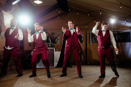 Outdoor dance floor under covered courtyard at Beaver Station wedding venue