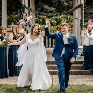 Bride and groom celebrate their garden wedding ceremony near Pittsburgh PA