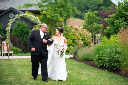 Father walks bride down the aisle during a garden wedding near Pittsburgh PA