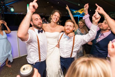 Couples and guests dance the night away on the covered Trackside Courtyard