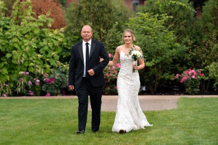 Father walks bride down the aisle during a garden wedding near Pittsburgh PA