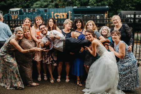 Couples and wedding guests enjoy their time together on the Trackside Courtyard