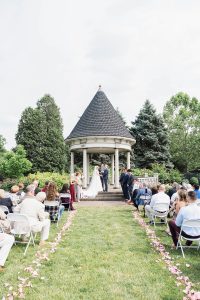 Outdoor garden wedding ceremony at Beaver Station in Beaver County Pennsylvania