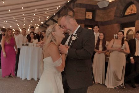 Outdoor dance floor under covered courtyard at Beaver Station wedding venue